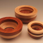 Rita Duxbury - Three small laminated bowls, 3.5_, 4.5_ and 5.5_ round, of various woods